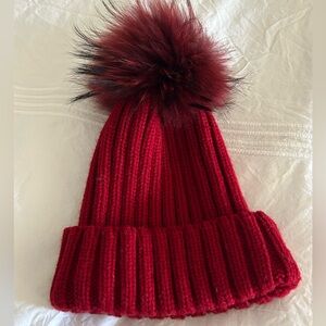 Red pom pom hat